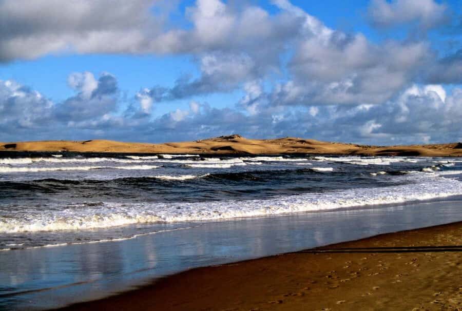 From Walvis Bay: Sandwich Harbour World Heritage Site - Sandwich Harbour Lagoon and the UNESCO Coastline Effect