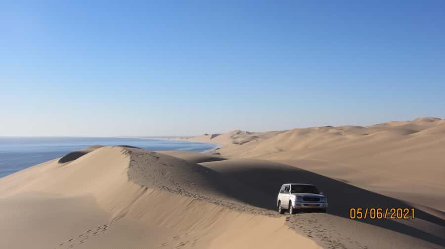 From Walvis Bay: Sandwich Harbour World Heritage Site - Guides Make the Difference: Charles, Herman, Hans, and the Best Kind of Patience