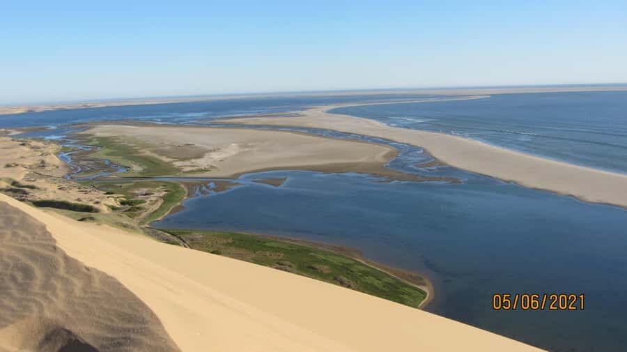 From Walvis Bay: Sandwich Harbour World Heritage Site - 4x4 Through Tidal Lagoons: Mudflats, Sandbars, and Birdlife Timing