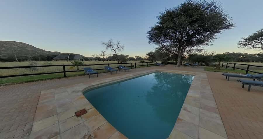 From Windhoek: Okapuka Safari Lodge Day Trip - Entering the ranch at the right pace: timing, pickup, and group size