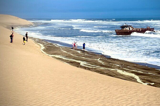 Full Day Tour Shipwreck Sandwich Harbour Adventure - Shipwreck viewing: the Shawnee and Eduard Bohlen stuck in place