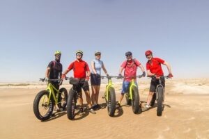 Scenic Desert Tour by Bike - Up the dunes: where your effort turns into a good kind of work